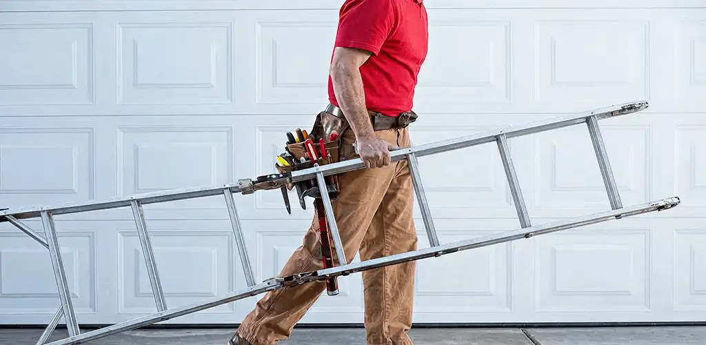 Garage door repair technician arriving with tools and ladder in Buffalo, NY